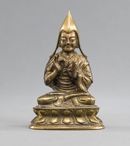 <b>Bronze eines sitzenden Lama, die Hände vor der Brust erhoben</b>